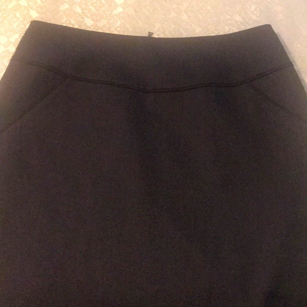 Nice dress knee length skirt never worn.